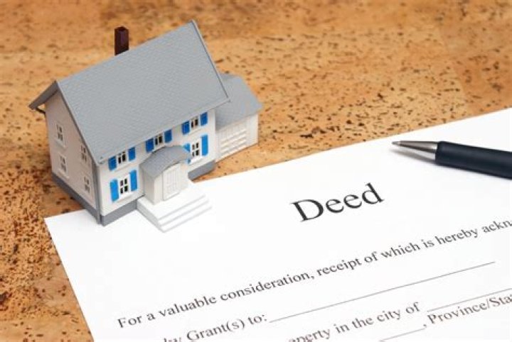 How do I change the deed on an inherited property