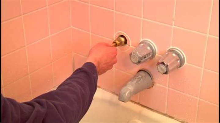 How do you fix a hot water tub faucet?
