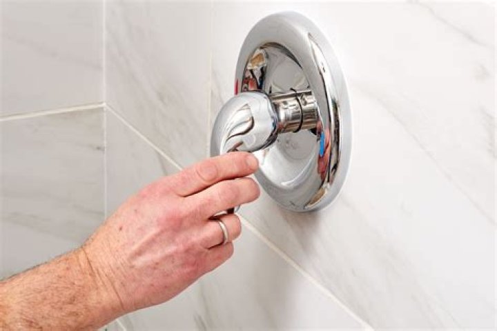 How do you loosen a shower faucet?