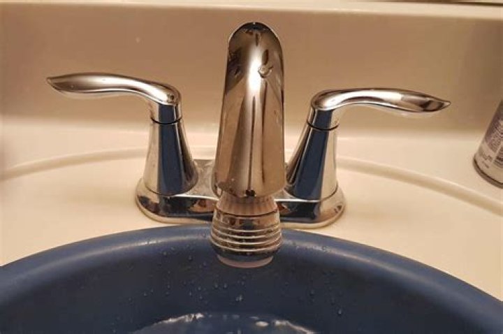 How do you remove handles from bathroom fixtures?