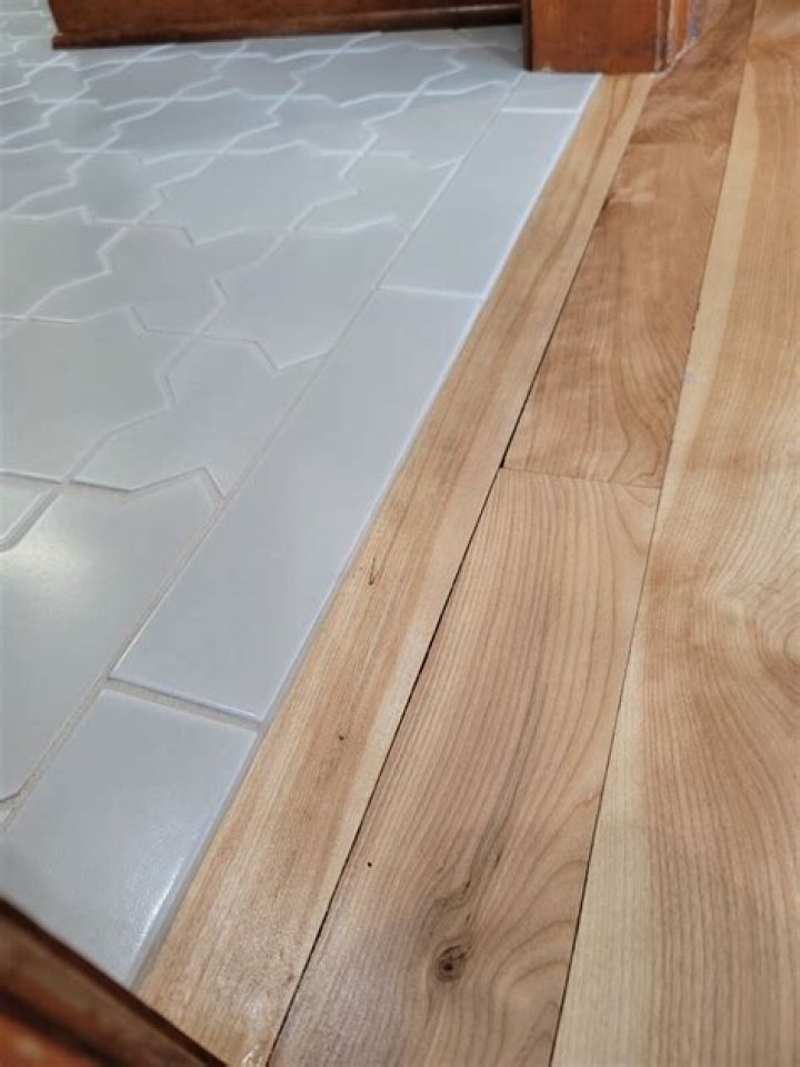 How do you tack a hardwood floor