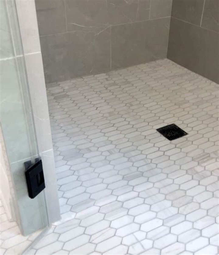 How long does a tiled shower floor last?