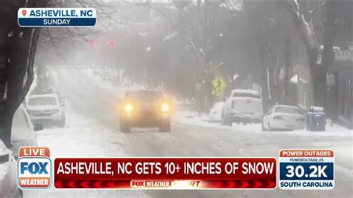 How much snow does Asheville NC get a year