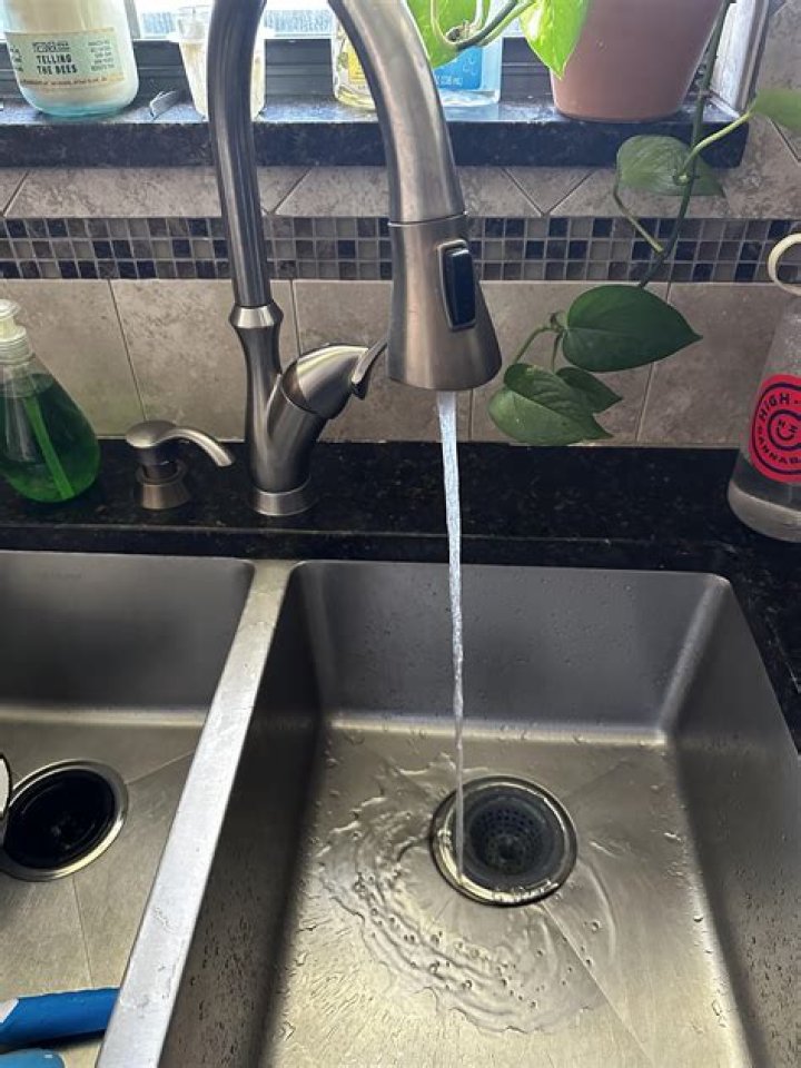 What causes low pressure in kitchen faucet?