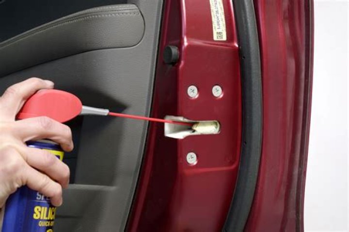 What should I use to lubricate car door hinges