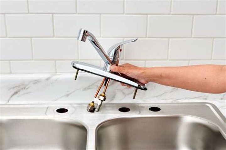What supplies do I need to replace a kitchen faucet?