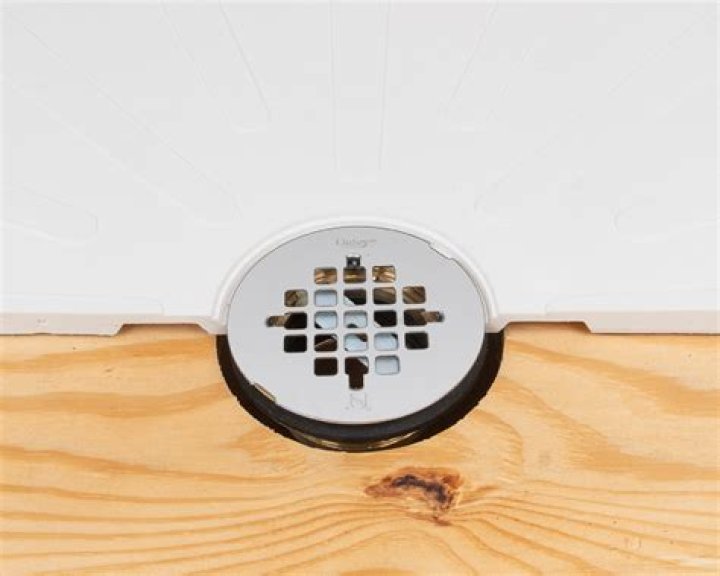 Where do the gaskets go on an oatey shower drain?
