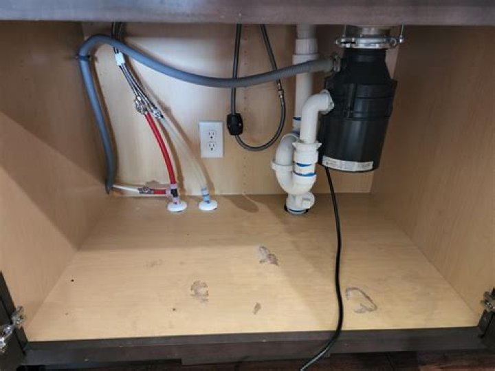 Why does my kitchen sink hose leak?