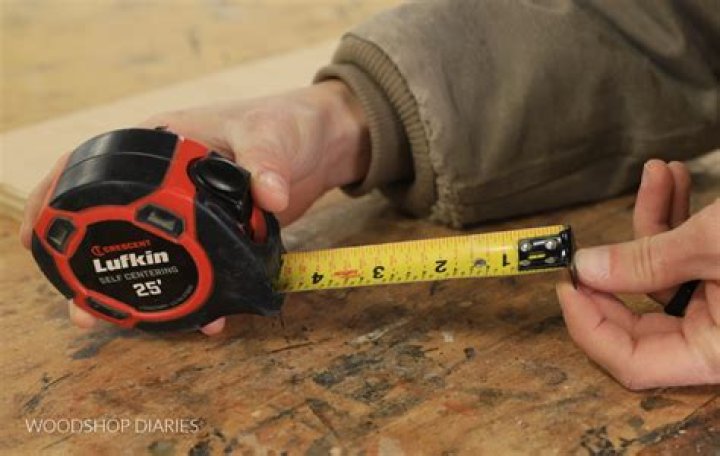 Why does the metal piece on a tape measure move