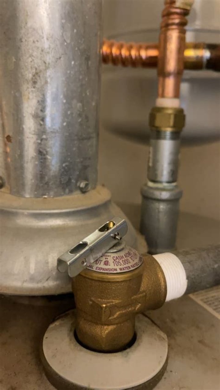 Why is my water heater making a whistling noise?